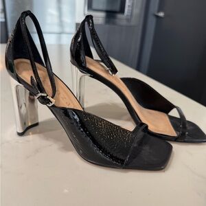 Sleek Black and Silver Strappy Heels